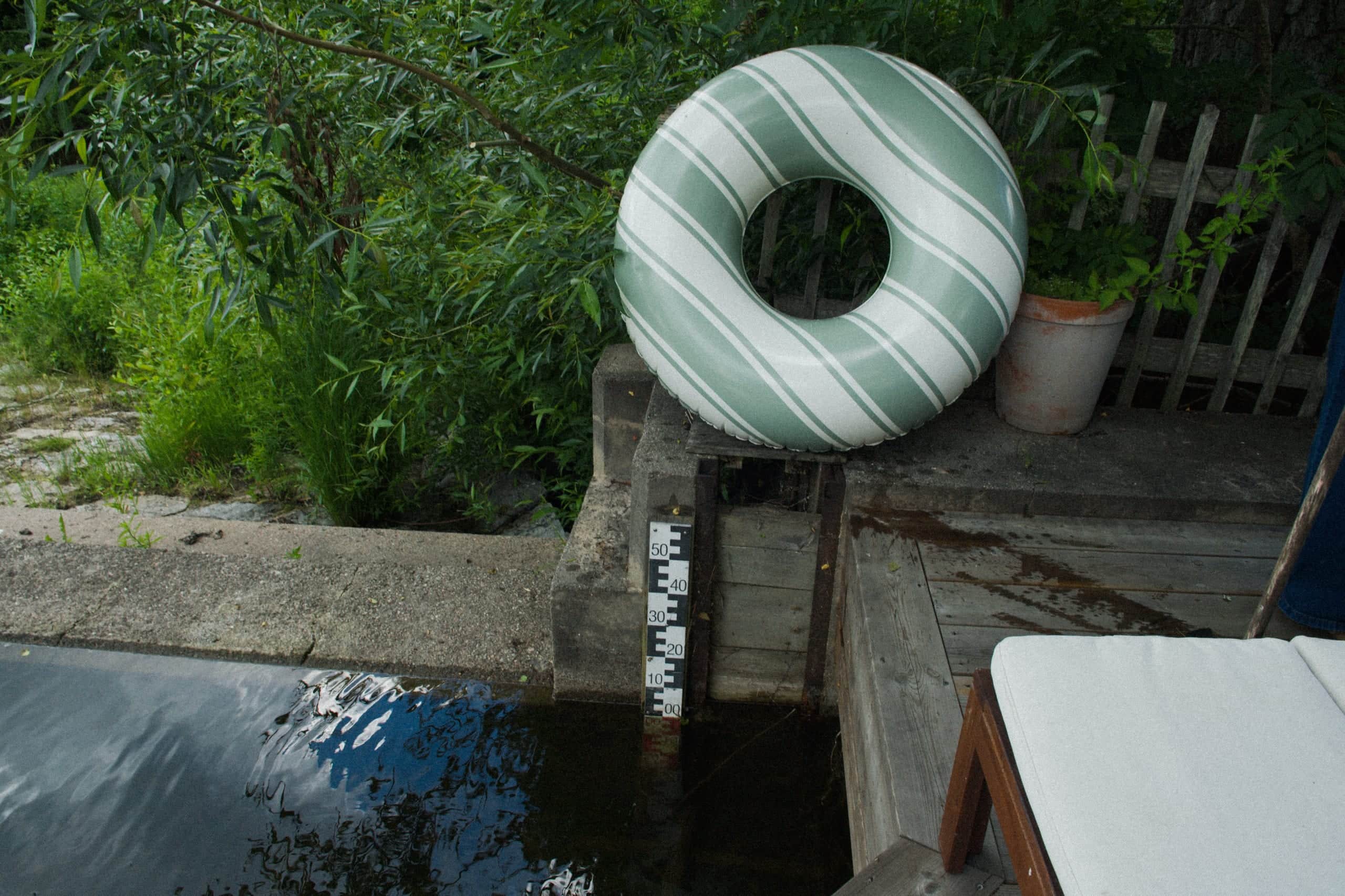 Swim ring by the dock at an Elvy lakeside home