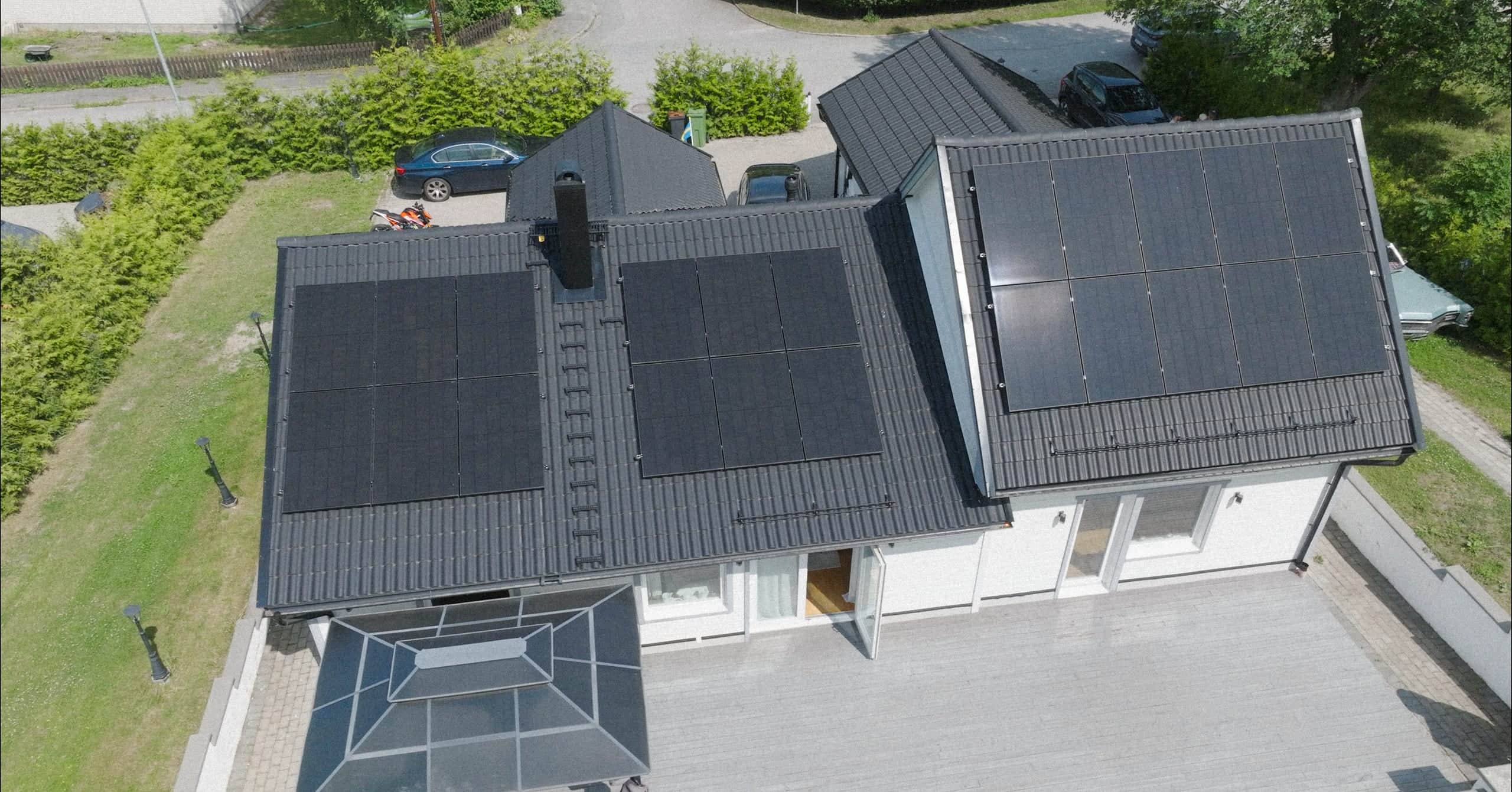 Aerial view of an Elvy villa with solar panels